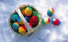 Basket Of Easter Eggs On Snow