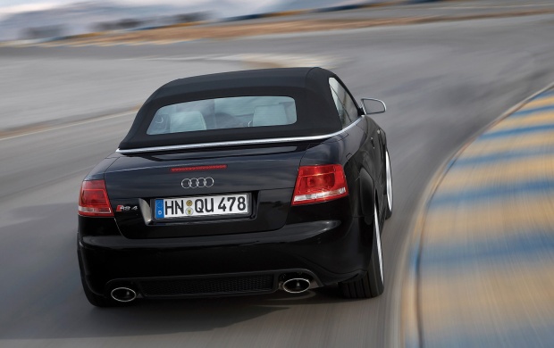 Black Audi RS4 rear on road (click to view)