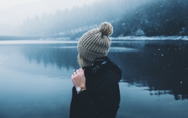 Blonde Girl On Snowy Lake