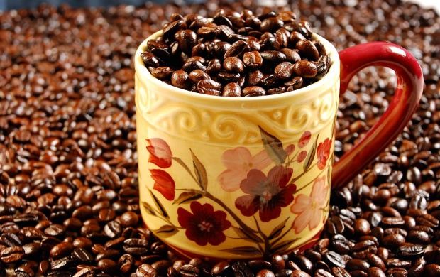 Coffee Beans And Yellow Cup