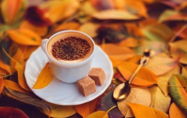 Coffee With Yellow Autumn Leaves