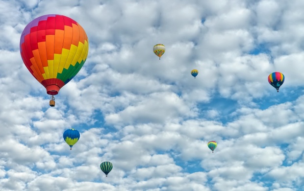Colored Balloons On Cloudy Sky