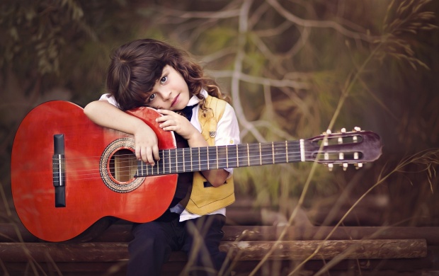 Cute Boy Hold On Red Guitar (click to view)