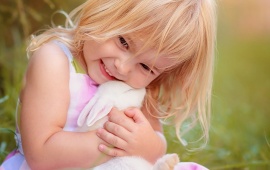 Cute Girl Joy With Rabbit