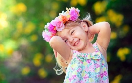 Cute Girl With Flowers Wreath