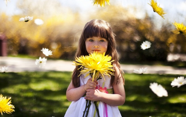 Cute Little Girl Holding Yellow Flower