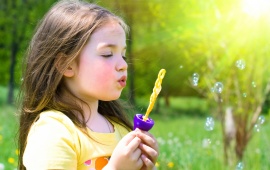 Cute Little Girl Playing Bubble