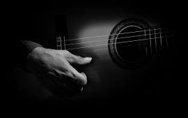 Dark Guitar Strings Player Hand