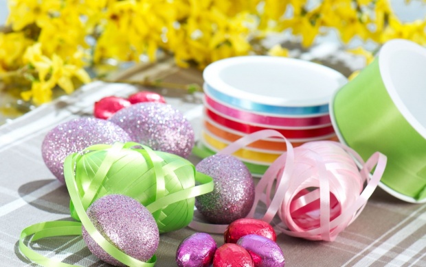 Easter Eggs And Ribbon On Table