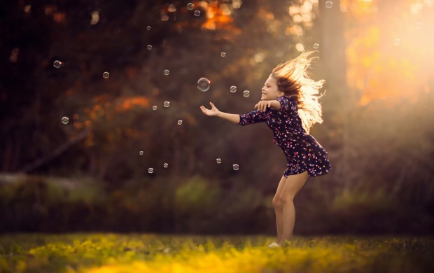 Girl Playing With Bubbles (click to view)
