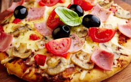 Pizza With Tomatoes, Ham And Olives