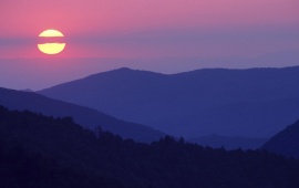 Purple Sunset Over The Mountain