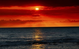 Sea Waves And Red Sunset