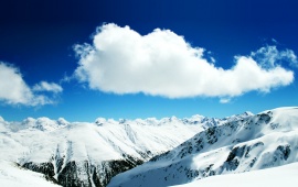 Snowy Mountains and Blue Sky