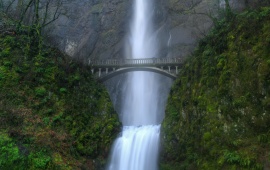 Waterfall behind the bridge