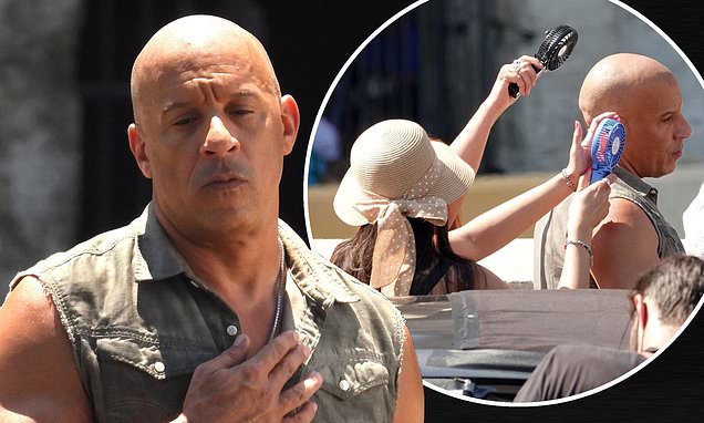 vin Diesel Is Cooled Down By Fan Waving Assistants While Filming Fast X In Sweltering Rome Daily Mail Online