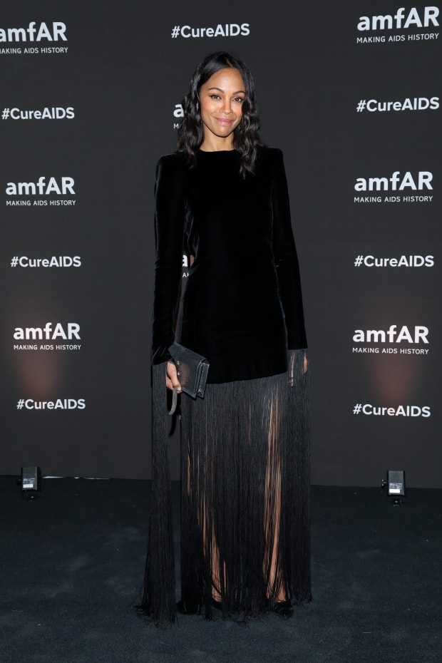 great Outfits In Fashion History Zoe Saldana In A Fringed Saint Laurent Dress Fashionista