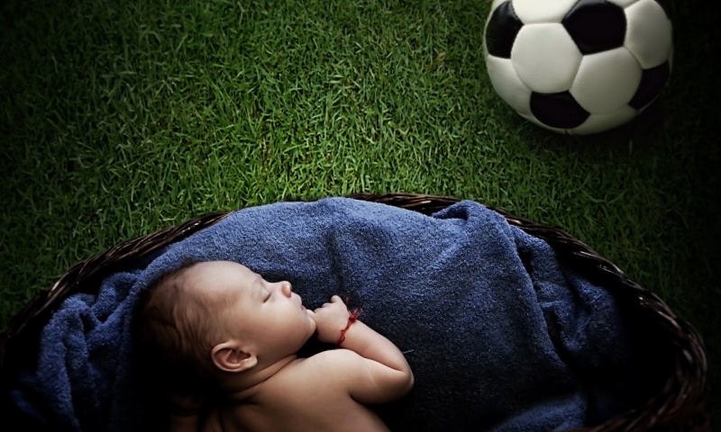 Baby And Football Ball