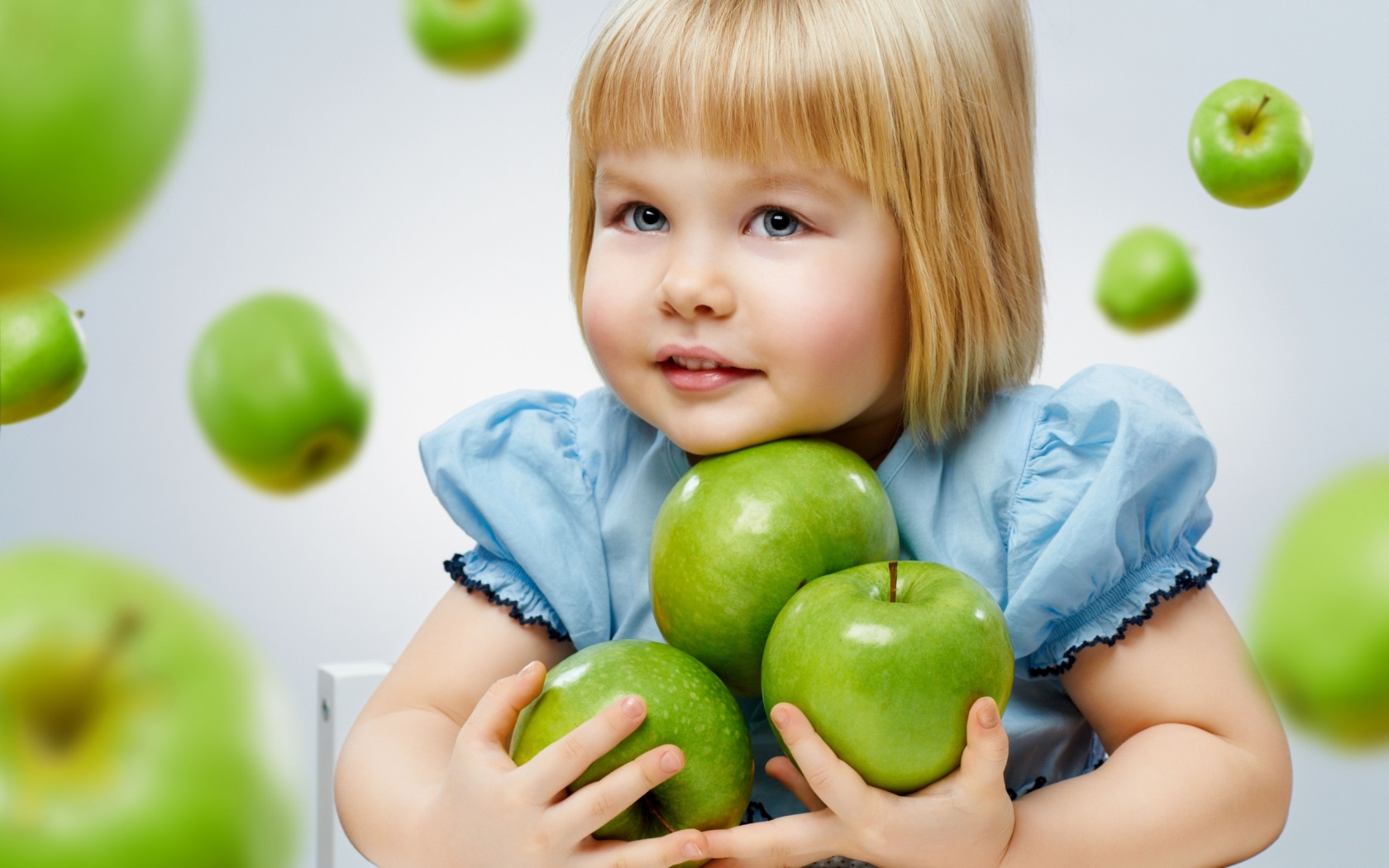 Cute Girl And Green Apple