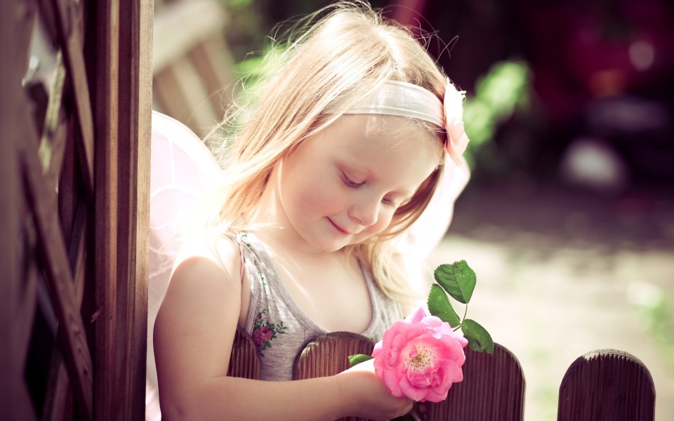 Cute Girl Holding Pink Rose