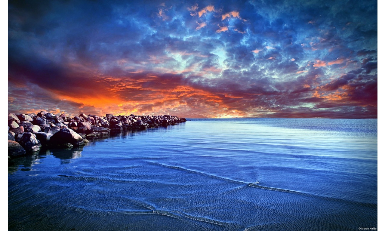 Dramatic Sunset At Sea Shore