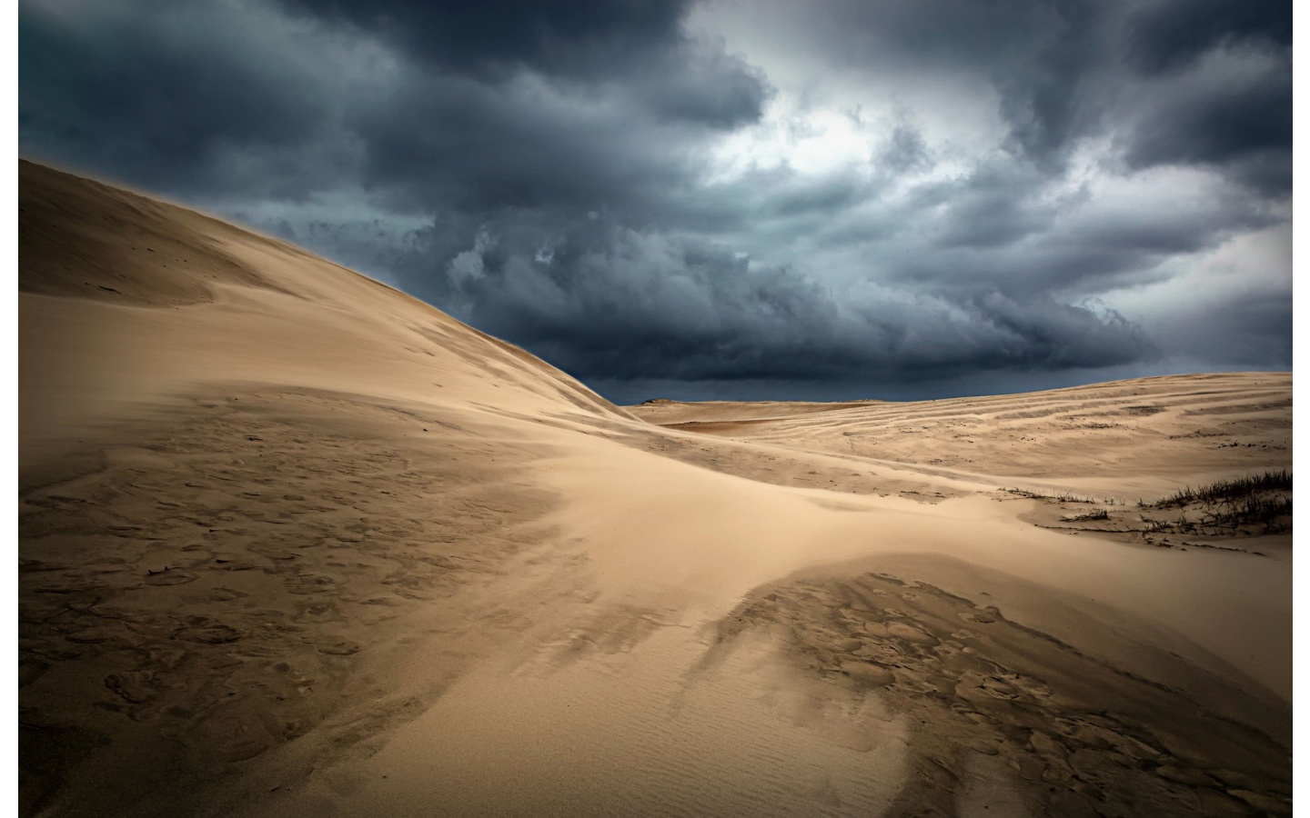 Stormy Clouds Above The Sand Dunes