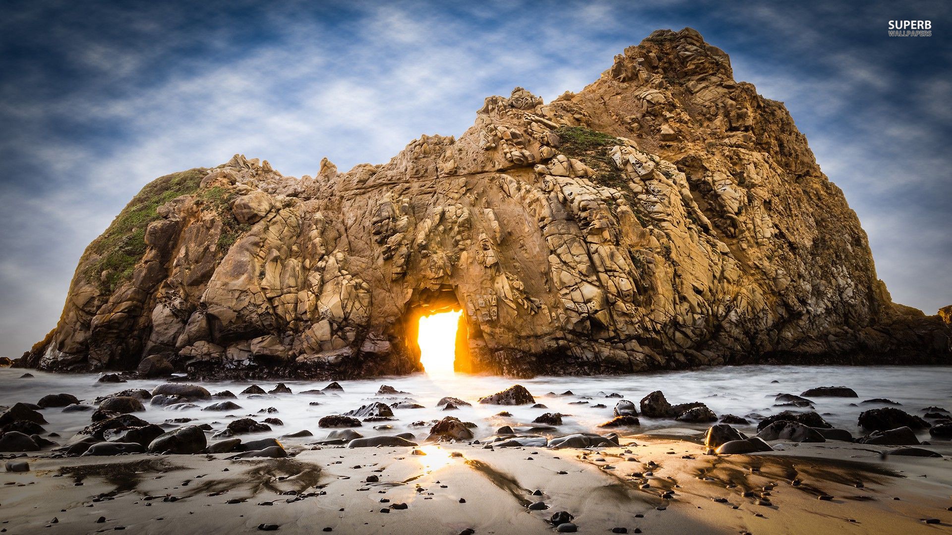 Sunrise Through a Rock Door