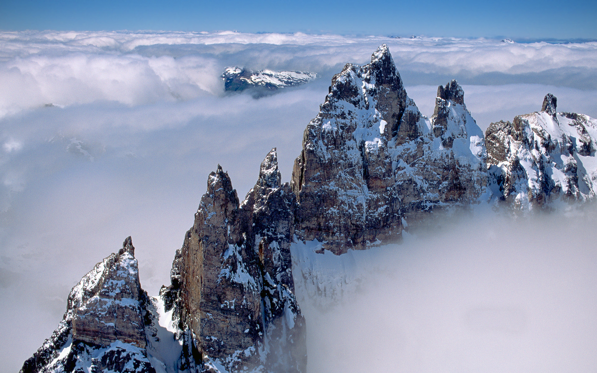 Mountain Peaks Above Clouds